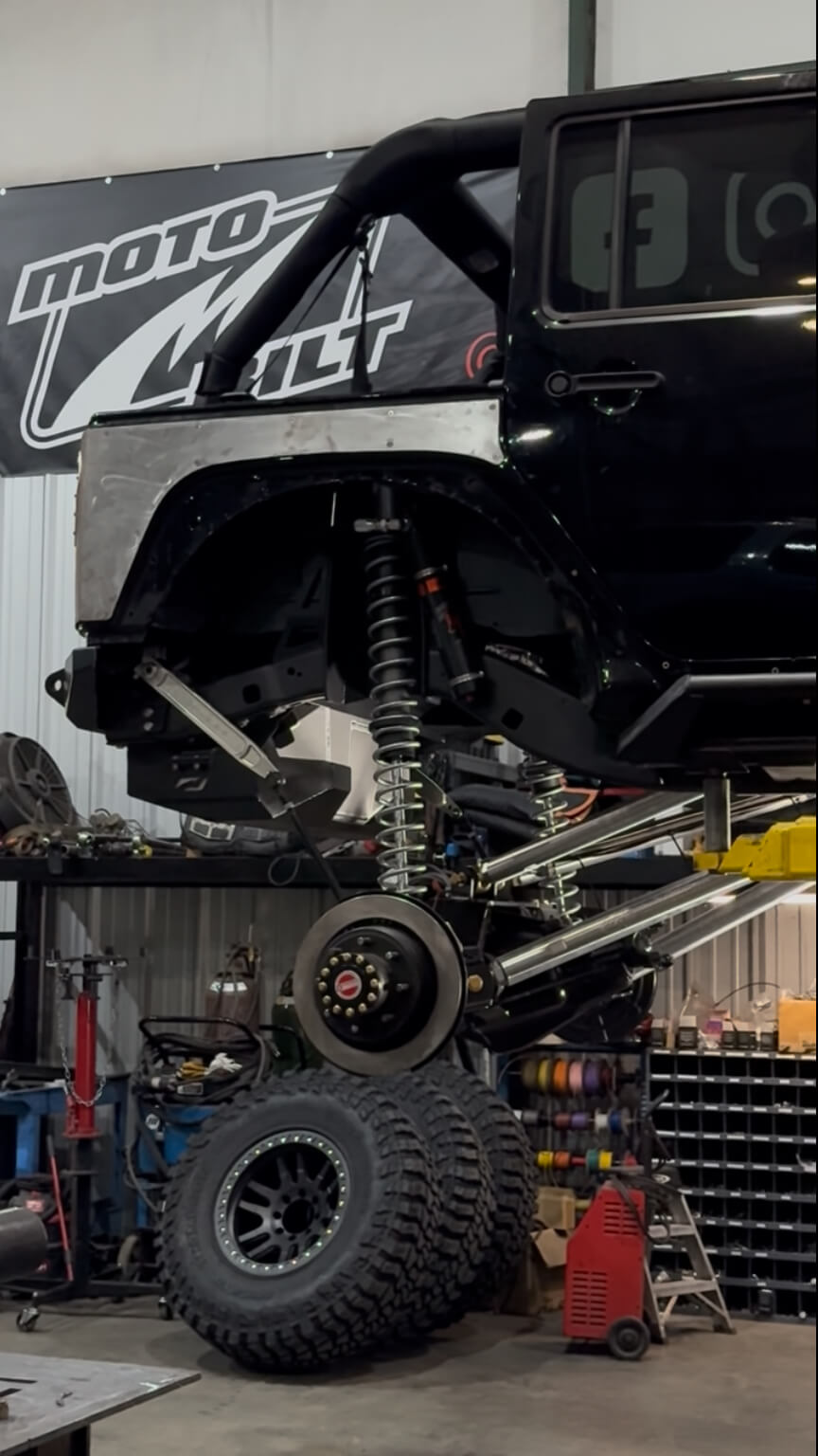 Motobilt Rear Coilover Mounts MB1554 for Jeep JKU shown installed with 16" 2.5" remote reservoir fox shocks with a dynatrac dana 80 rear axle
