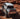 Rear view of Jeep Gladiator with steel Motobilt Bobbed Bed and protected lighting