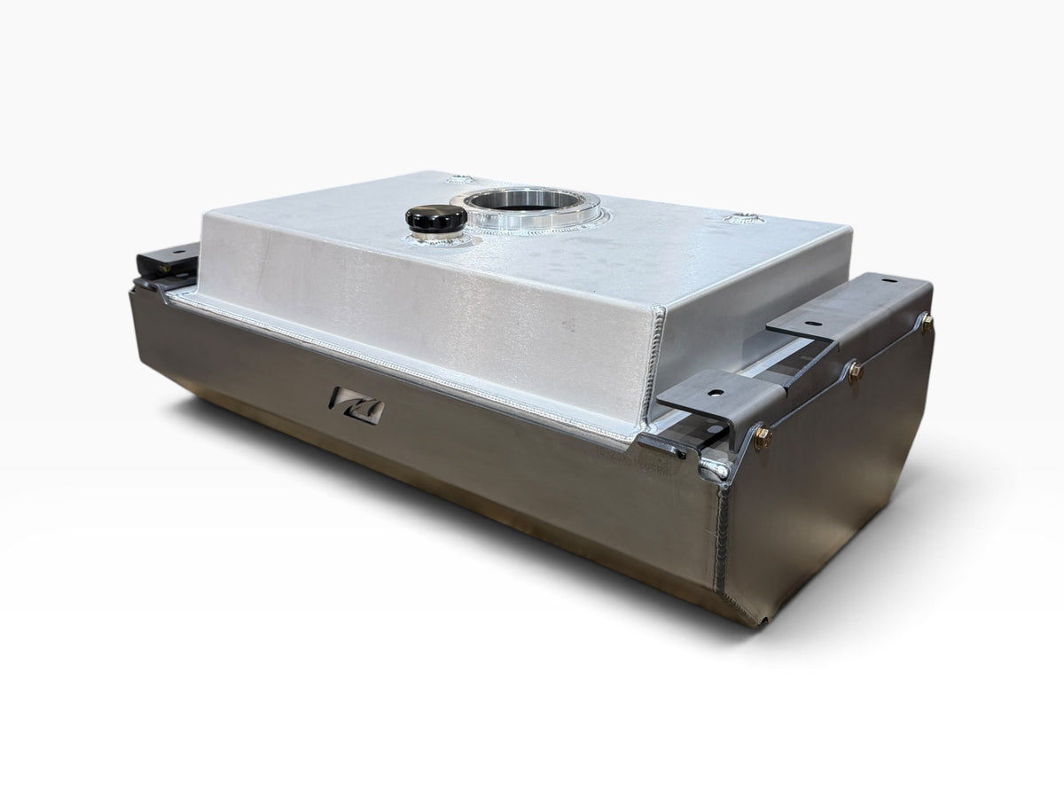 Three-quarter view of Motobilt MB5074 aluminum fuel cell with filler neck and skid plate